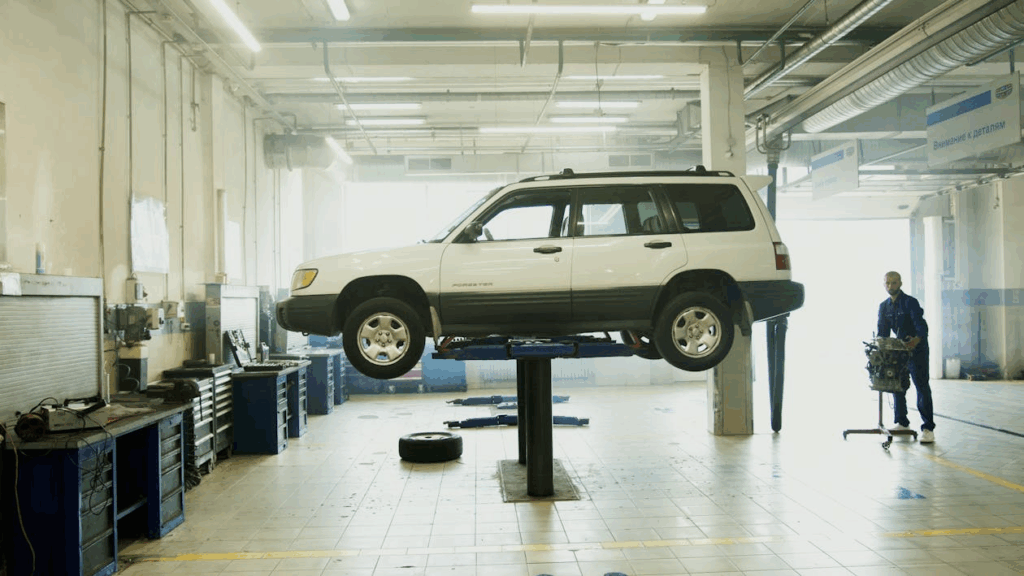 Older SUV on a lift at repair shop showing rising repair costs.