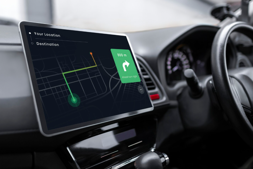 Large dashboard touchscreen showing navigation and infotainment features.